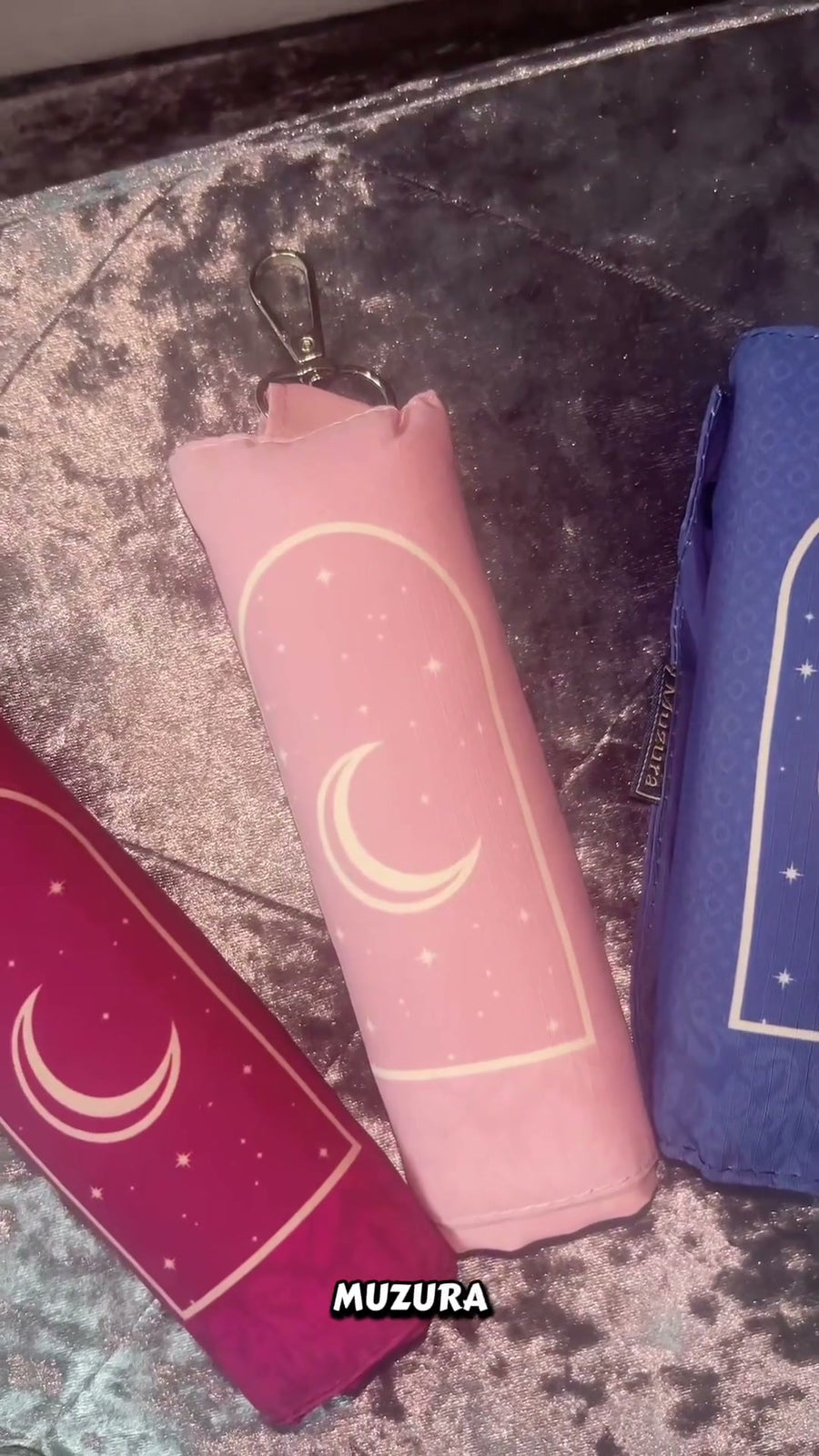 Three colours of the rolled Muzura prayer mat